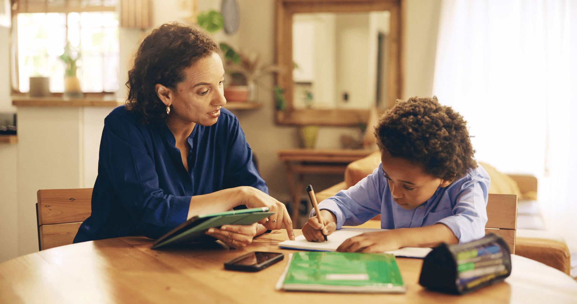 Mother and child doing homework together